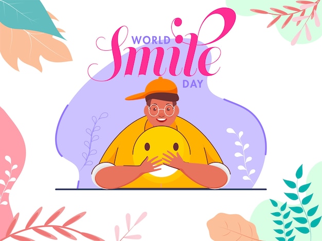 World Smile Day Poster Design with Young Man Holding a Smiley Emoji and Colorful Leaves Decorated on White Background.