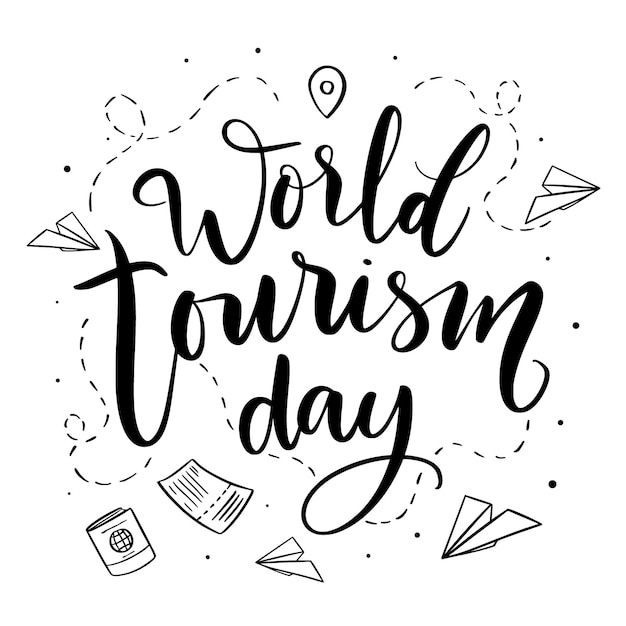 World tourism day lettering with paper planes