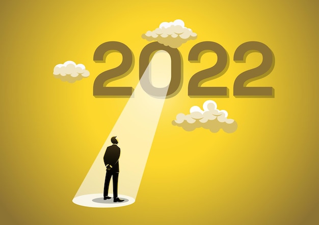 Vector year 2022 with bright spotlight from number zero light up on hopeful businessman