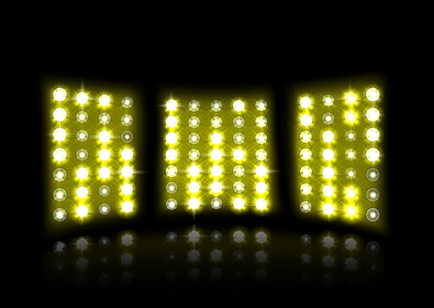 yellow Floodlight of stadium on a dark background