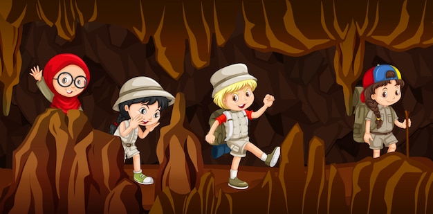 Young children exploring a cave