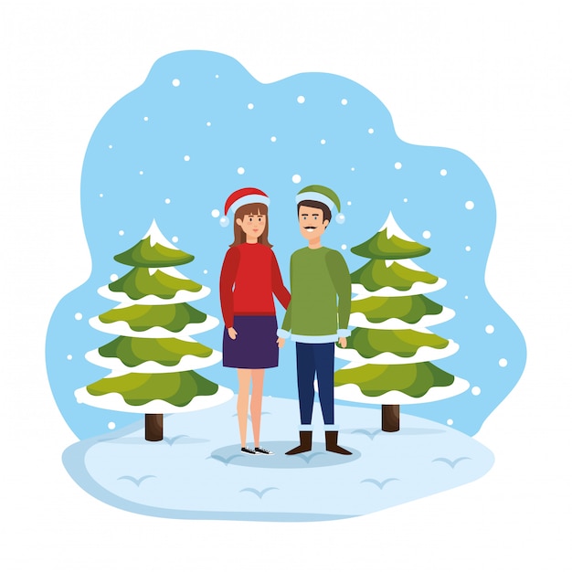 Young couple with winter clothes in snowscape