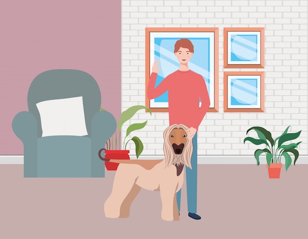 Young man with cute dog mascot in the livingroom