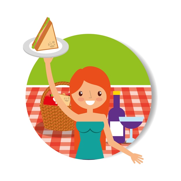 young woman holding sandwich in picnic