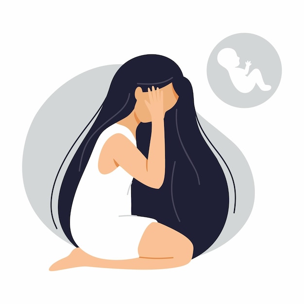 Young woman is sitting on floor and crying. Infertility, miscarriage and pregnancy problems. Women health.