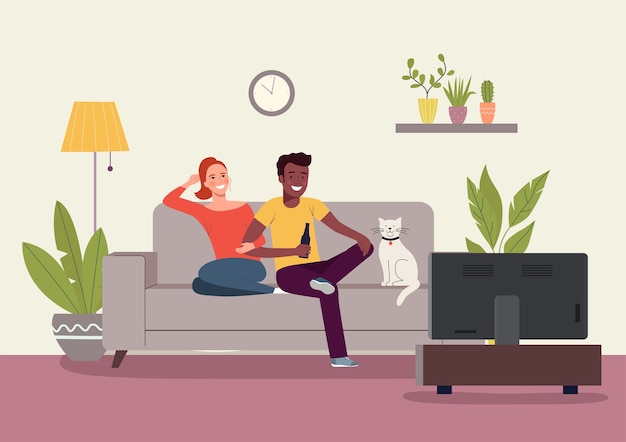 Young woman man and cat  sitting on sofa and watching TV in the living room