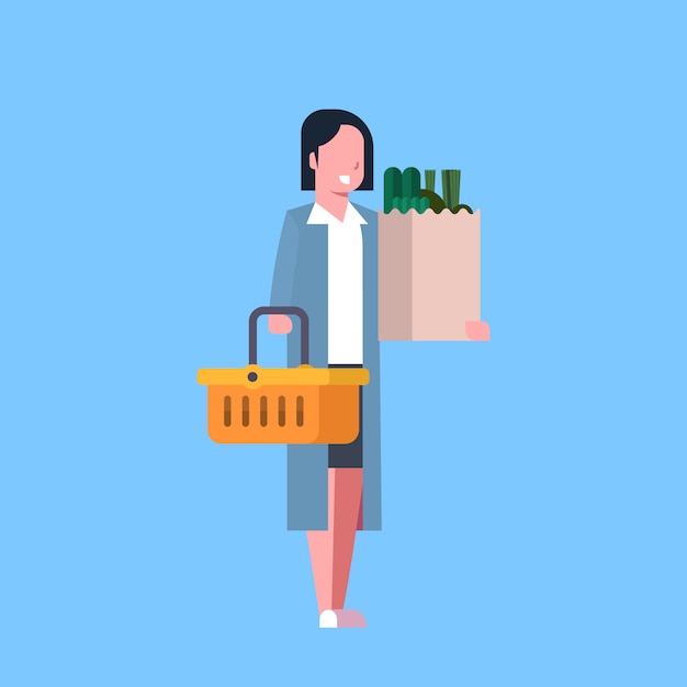 Young Woman Shopping Holding Paper Bag And Basket Full Of Grocery Products