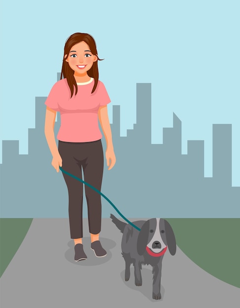 Young woman walking dog in the park