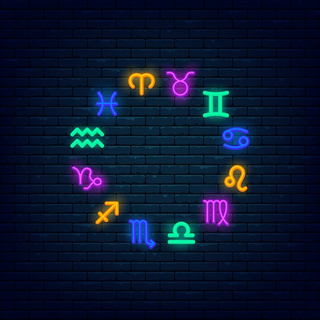 Zodiac symbols colorful neon banner at brick wall